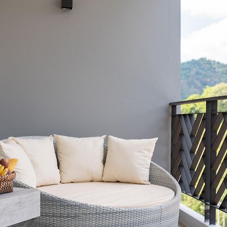 Anana Ecological Resort Krabi - Sha Extra Plus Ao Nang Exterior foto A balcony with a rattan chair